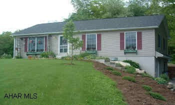 Northern Bedford Schools-3 Bedroom Raised Ranch- 2 Years old. Immaculate condition. Superior concrete poured & insulated basement walls. Radon elimination system built in. Bathroom first & second floor. Oak kitchen. Basement 75% finished. 1.17 acres which boarders State Game lands. Nicely landscaped.Restrictions apply.
