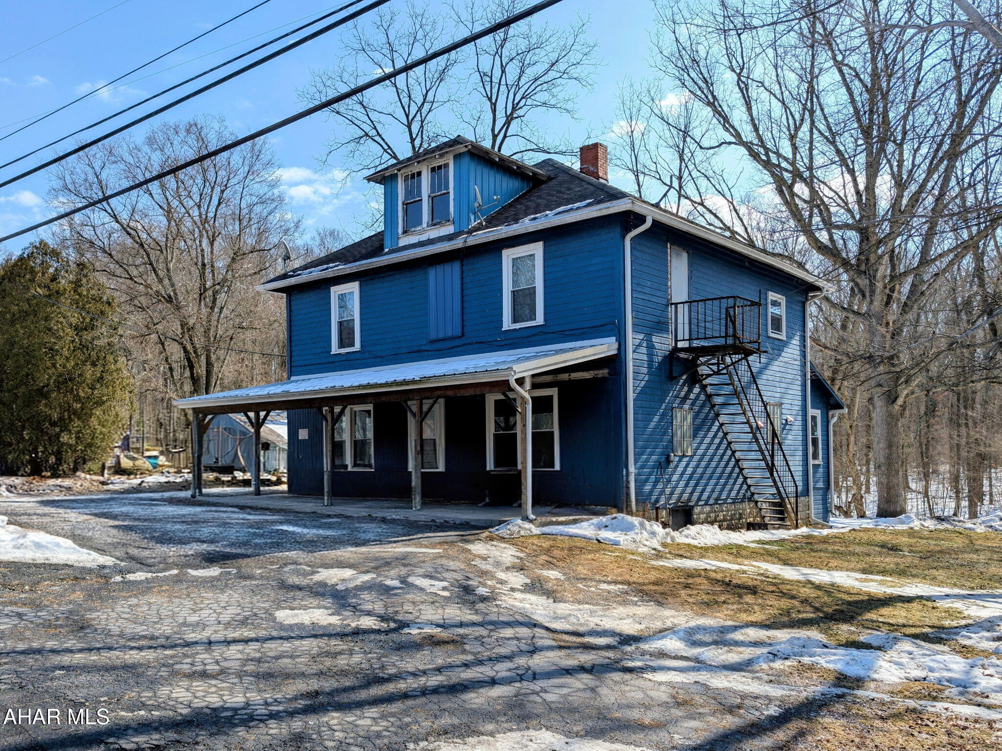 What an extraordinary investment opportunity in the heart of Bedford County, Pennsylvania. This 12.055-acre property in rural Schellsburg offers a unique blend of rustic charm and untapped potential. Featuring a classic fixer-upper home, alongside six charming cabins, this parcel is brimming with possibilities for the savvy investor or creative entrepreneur.

The main house awaits your vision to transform it into either a primary residence or an inviting retreat. Each cabin, nestled amidst Bedford County's countryside, provides potential for someone with a creative edge.

The setting lays the groundwork for creating memorable experiences and potential for inspiring spaces.  This property could be a destination that capitalizes on outdoor pursuits like nearby hiking and fishing, or crafting unique lifestyle offerings - this property's versatility ensures endless opportunities.

Conveniently located within 15 minutes of historic downtown Bedford, Flight 93 Memorial and within 5 minutes of Shawnee State Park, this property offers vibrant community amenities while offering a rural setting of farmland and quietness.  If you're a savvy contractor or a buyer with a dream of fixing up and creating a unique spaces, this property has the potential to be something special. 

This property is currently enrolled in the Clean and Green program.  Buyers may want a feasibility period to verify if property can be used for buyers desired purpose.  Schedule your own tour today!