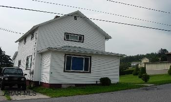 LARGE EAT-IN KITCHEN WITH RANGE & DW. FIRST FLOOR LAUNDRY ROOM WITH WASHER & DRYER. NEW DRYWALL, WINDOWS & ROOF. MODERN BATH. STAIRS TO ATTIC FOR STORAGE. LARGE DECK, VINYL SIDING. NEEDS FLOOR COVERINGS. HOME WARRANTY.