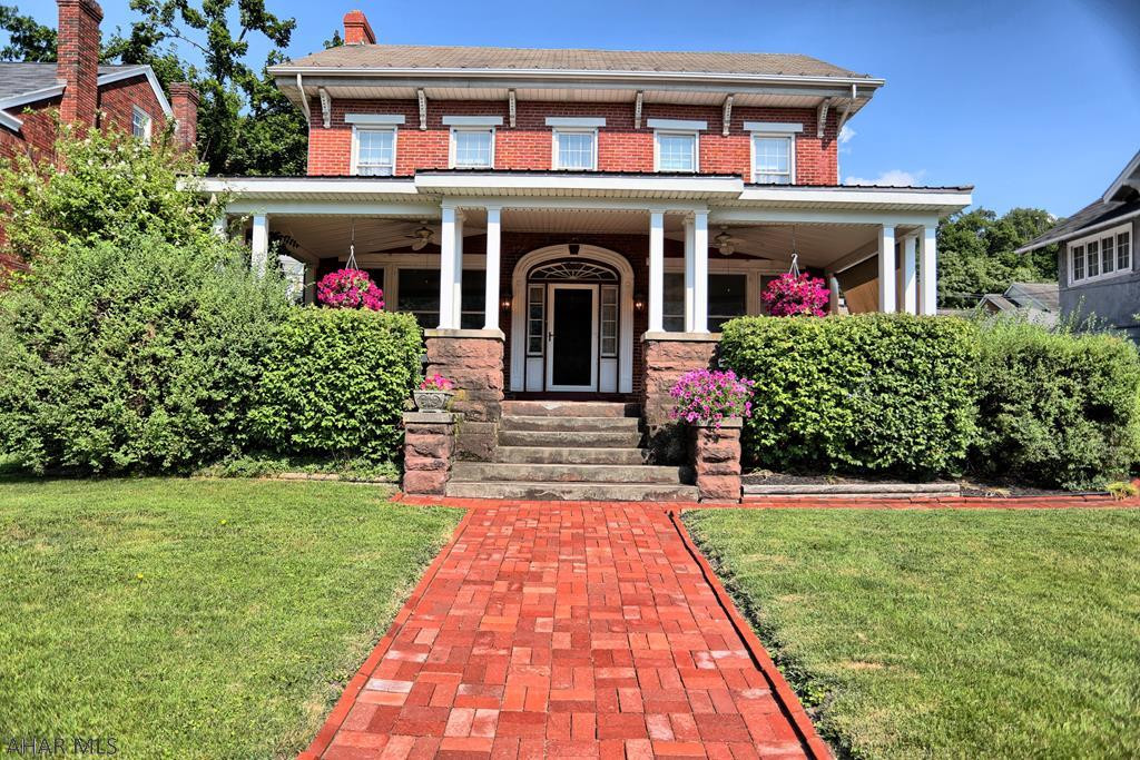 Gorgeous 4 bedroom, 4 bathroom house with large welcoming front porch and detached 2 car garage. This house has many unique features including 4 fireplaces, built-ins, and a sizable foyer.  Spacious bedrooms. Walk up attic with ample storage and partially finished basement with lots of possibilities. Don't miss this opportunity to make this charming house your home.