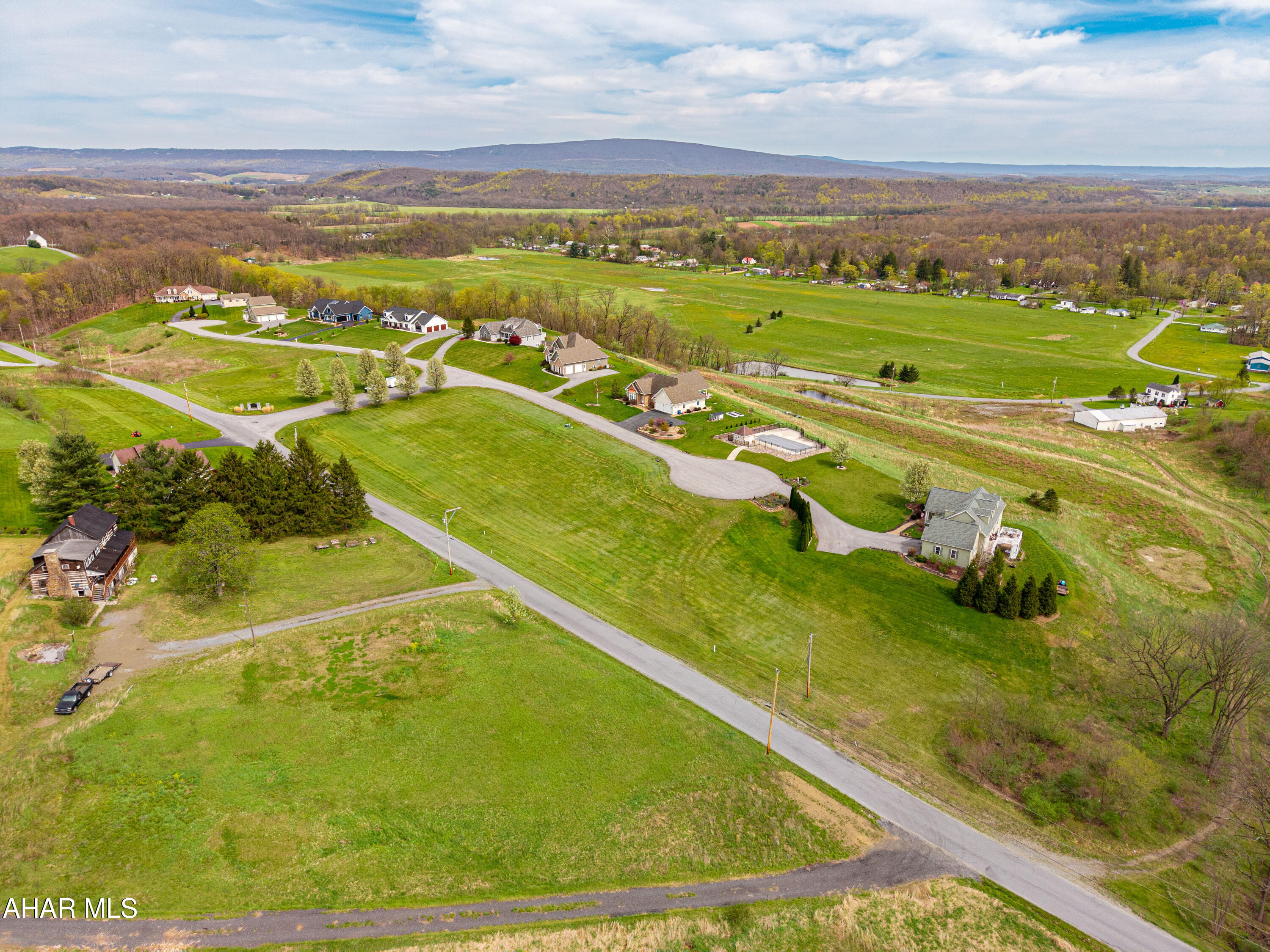 Space to breathe, community to enjoy—welcome to Grandview. 

Build your dream home in Grandview development! This spacious building lot offers public water, underground electric, and access to a community pool. A perc test is already on file, so you're a step ahead in the building process. Great location, solid infrastructure, and plenty of potential—don't miss out!