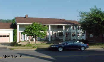 Great family home. 2 story, 3 bedroom, 2 baths, finished basement, enclosed porch, 2 car garage, very nice yard. allow 60 days from accepted agreement to obtain possession. The  owners live next door, the parents live in this home. There is a 500 gallon fuel oil tank buried under the patio and is not used. There is a 1000 gallon tank buried beside the home on the alley side that is used. There was a fire iin this home in 9/88. Damage was limited to the front wall basement, dining area floor and front bedroom wall. The cause was from an electrical malfuntion. All damage was repaired including new carpet basement & first floor, new panelling basement, new dining area floor. Please note the main bath shower stall has a leak in its base and could be corrected. Also note the front porch has some settlement of the concrete floor. This home has insulation in the walls and attic floor. There is good closet space in this home. ***This home had water flooding in the basement several years ago. The problem was an off-site runoff that has been corrected. This area is near a flood plain. There is a plug in a basement drain that may allow some seepage onto the carpet in an extreme rain.