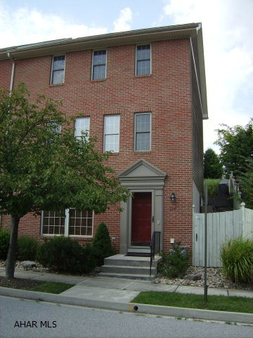 Beautiful end unit townhouse - Pristine condition - + 2 car garage, quiet neighborhood, extra outdoor space @ side. Large rear deck w/awning LR, DR, Fam Rm, Kit, 2.5 baths, 3 BR's. Appraisal on file. High end light fixtures throughout.