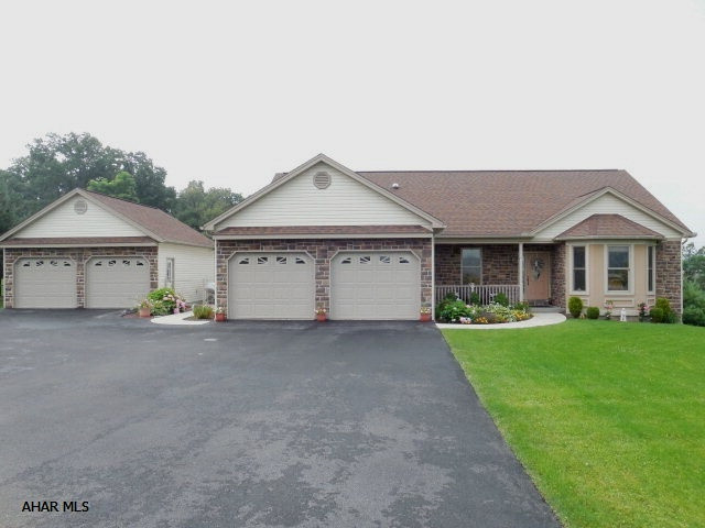 This 3 bedroom, 3 bath,  one story custom built home has quality workmanship throughout. An Open floor plan with nine foot ceilings, solid oak  doors, cabinets and trim, all. Anderson thermo pane windows. A Beam central vacuum, electric air filter, Pex plumbing with individual shut offs. Charming sun room with solar blinds, vaulted ceiling with fan. Finished walkout lower level has a mirrored exercise room, workshop,3/4 bathroom, very large family room, game room, covered patio and so much storage. Exterior has manicured gardens, Two trex decks, one with a gazebo. Two car attached garage plus additional 2 car detached. Beautifully landscaped with a fenced in yard. To view virtual tour go to tool bar click movie reel.