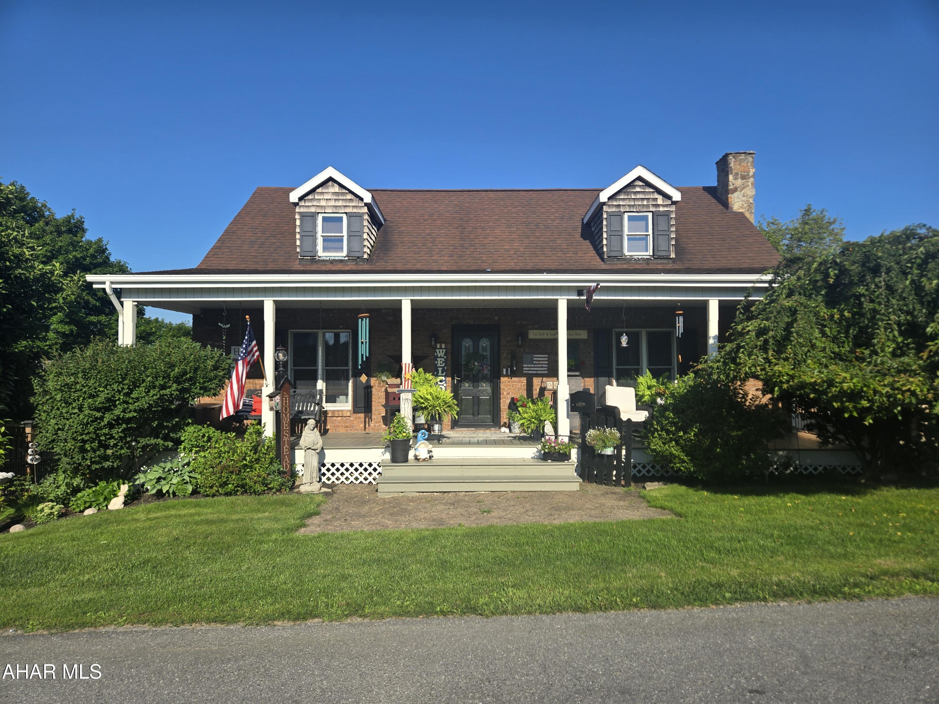 Beautifully decorated, move in ready home in Gallitzin!  Living room, new kitchen, laundry and sitting room, bedroom and bath on 1st floor. Second floor has 2-bedrooms and a bath. Oil, hot water heat with natural gas hook up available at house. Basement currently has a bedroom and bathroom. Could be finished to suit your needs. 2 car attached garage. Bonus lot w/large 2 car garage.