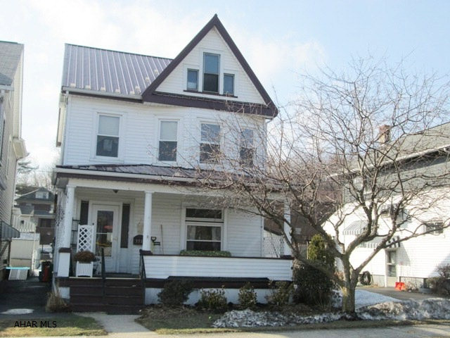 Mansion Park area. Imagine watching football and baseball from the comfort of your front porch. This 3 or possibly 4 bedroom home is handy to everything: transportation, sports and restaurants. The home features newer metal roof, new windows, updated eat-in kitchen and updated full bath. The rear off street parking leads to the fenced back yard. Don't miss this great family home.