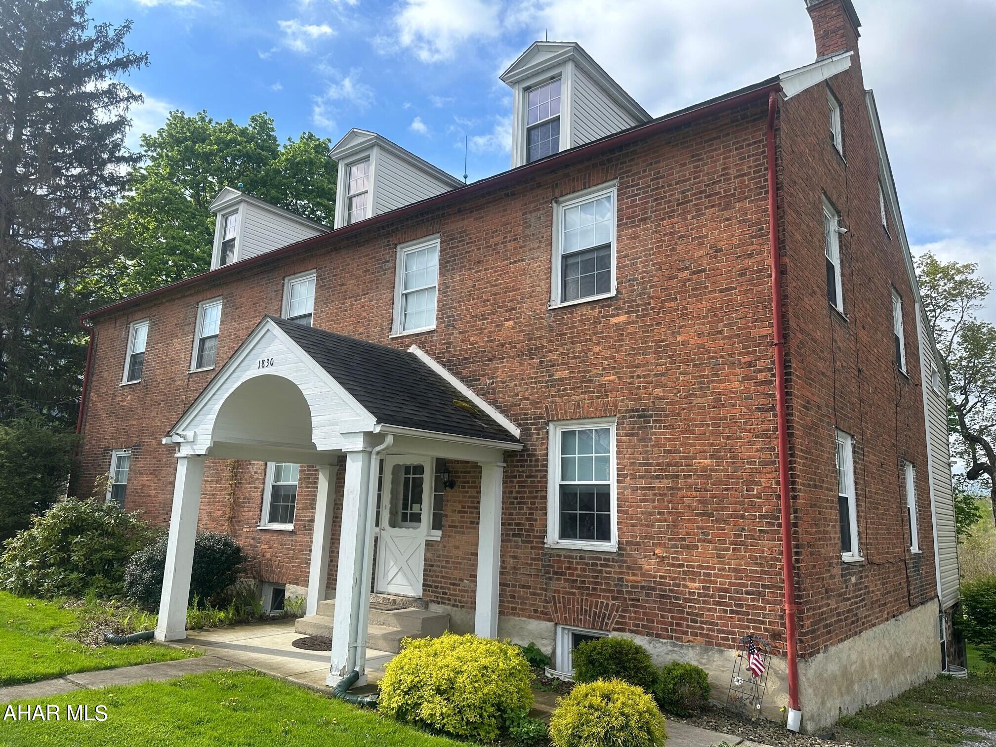 Beautiful Colonial, previously a Bed and Breakfast built in 1830, still holds all it's original charm.  This home features beautiful pine wood floors and 7 fireplaces. The second floor is set up as an efficiency apartment with self contained kitchen and bath and the third floor was redone as an apartment as well.  This home has endless possibilities from returning it to a Bed and Breakfast or a small business on the first floor and live in the upstairs. This is a must see! Home is being sold AS IS! Buyer to verify taxes and square footage.  No commission paid on Seller Assist.