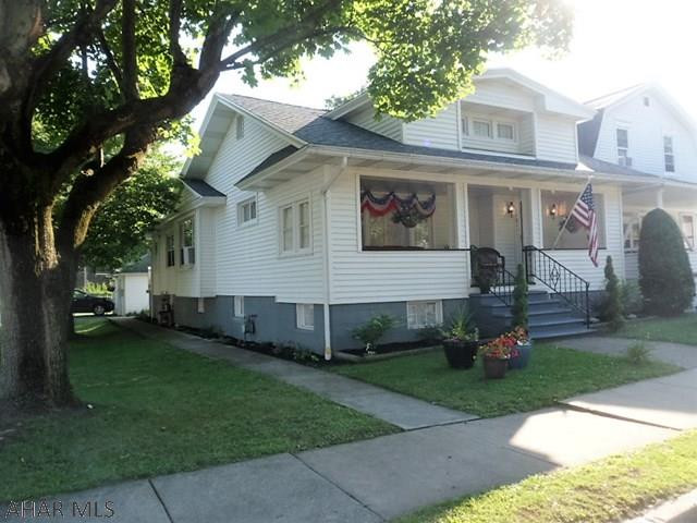 MUST SEE...Charming home on corner lot, 1 story, 2 or 3 bedrooms, 1.5 baths, large open living room and dining room area, modern eat-in kitchen with appliances, rear mud room, walk-out basement includes a family room or 3rd bedroom, walk-in closet, 1/2 bath, kitchen, laundry, utility room, and two storage areas. Cozy front porch, NEW wiring throughout, NEW sheathing and roof.  2 car garage...$119,900.  PLEASE REMOVE SHOES.  BE CAREFUL NOT TO LET SMALL ELDERLY DOG OUT.  THANK YOU.
