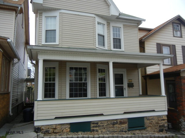 Super nice 2 story with vinyl siding, soffit and fascia, newer windows.  HW floors in downstairs, nice kitchen, first floor laundry.  Nice sized bedrooms, third floor (unheated) finished for playroom or storage.  Fenced back yard with waterfall and pond.  Two car garage.