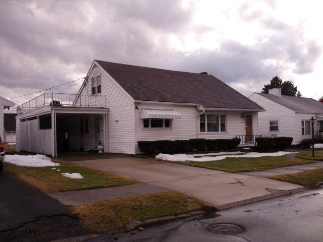 Nice 2 bedroom, 2 bath home with sunroom, hardwood floors, carpet, vinyl windows & siding, newer central air.  #J-237