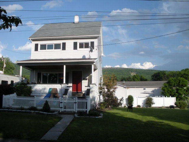 Pleasant Valley 3 Bedroom vinyl sided home with large corner lot and 18X36 inground pool just in time for summer.  The interior has many updates, like laminate floors.  New windows with 50 year warranty, new efficient furnace with central and air purifier.  Nice eat-in kitchen, updated full bath with tile shower surround.  Fire pit area, large off street parking area.  Roof replaced in 2007.