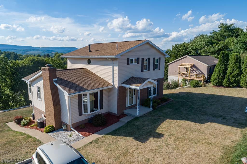 What a House!  Spotless and well maintained.  So much living space.  4 Bedrooms and 4 Baths.  Large Dining Room.  Newly updated Kitchen with Eating Area and Island.  Large Covered Trex Deck off the Kitchen...What a View!  Living Room is L Shaped, New Carpeting, Fireplace and Auto Timed Blinds.  The Sun Room/Breakfast Nook is amazing.  Panaramic Windows and Views.  Basement is fully Finished with Family Room, Office Area, Gorgeous New 3/4 Bath, Bedroom with WIC, Man Cave Bar area and Laundry.  The property is Half an Acre.  Beautifully Landscaped and Terraced.  Trex Walk Way and Steps to an additional Deck.  Large Shed.  Roof is Brand New 07/2020.  CA, Hot Water Tank and Furnace 2010.  Property is back on market due to Buyer getting transferred. Inspections and Appraisal were complete.