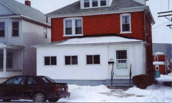 Newer hot water boiler and hot water tank. Replacement windows and newer soffit and fascia.
