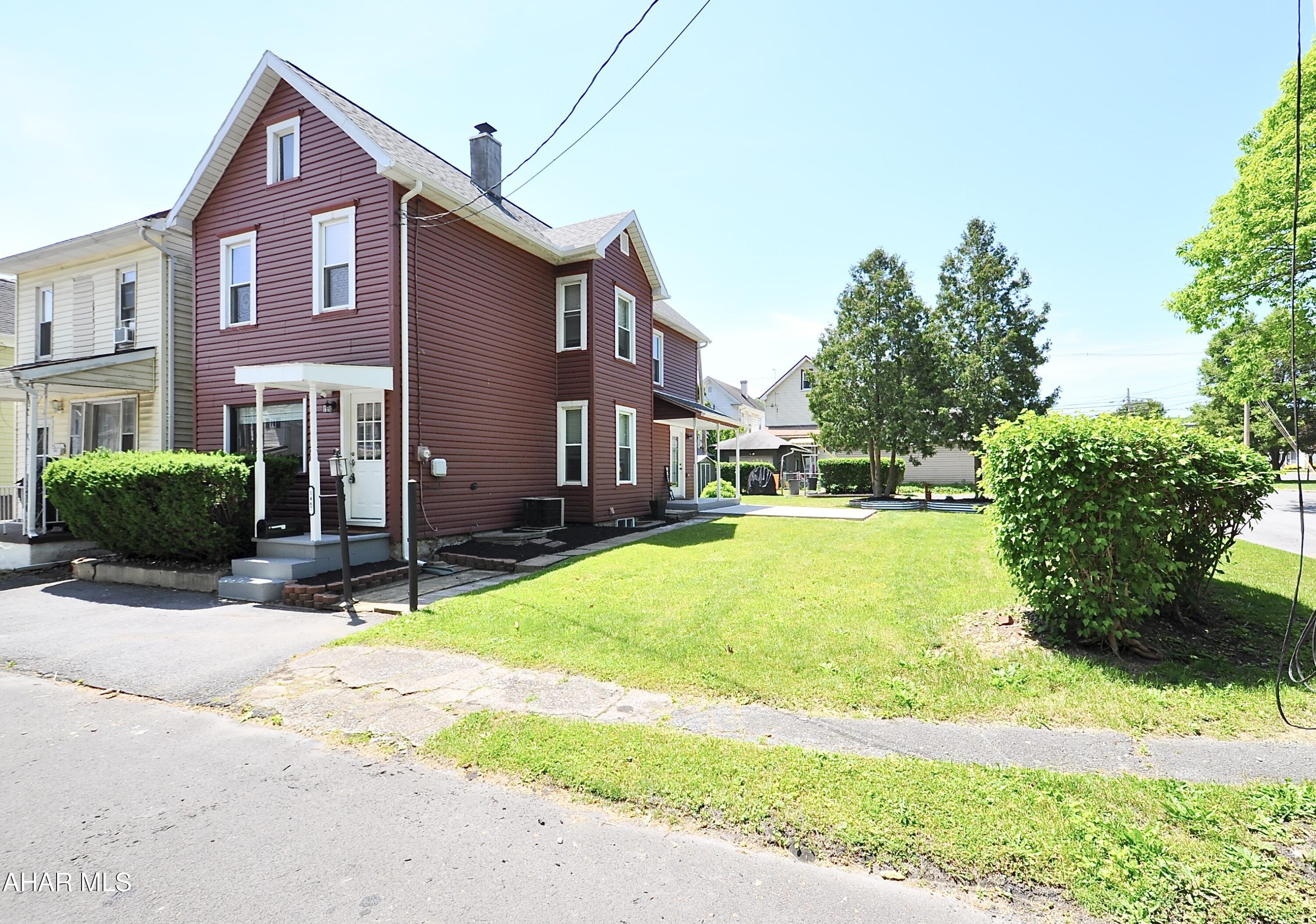 Wow! So much has been done to this wonderful 2 1/2 story home on a double corner lot in Tyrone Borough. New vinyl siding, roofs, gutters and downspouts in 2022. chimney stuccoed, lined and capped in 2023, new poured patioi in 2024, new front door in 2024, all new appliances, the list goes on and on. See the photos and see the house soon this won't last. This property is NOT in any flood zone. Public access to Little Bald Eagle Creek is one block away and offers access to excellent trout fishing!