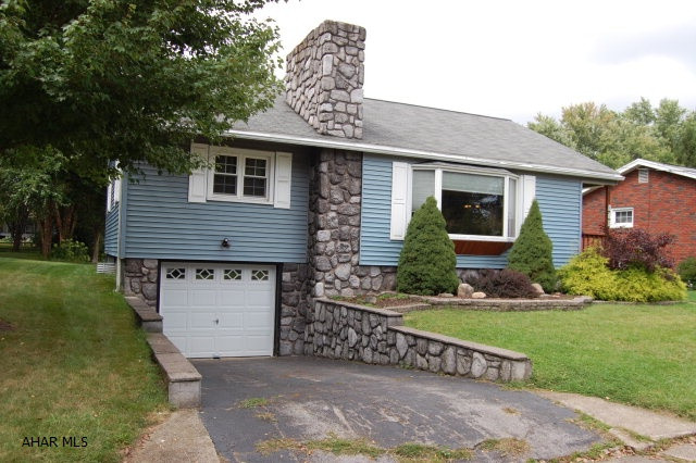 REDUCED!!!!MOTIVATED SELLERS.  One floor living with this beautiful 2 bedroom, 1 full bath house located a short distance from PSU altoona campus. House sits on a private lot at the end of a low traffice Cul-de-Sac.  Hardwood floors throughout with newly added front porch and garage door. Gas fireplace in the family room for those cold winter days. Updated spacious remodeled full bath.  Great location, great price.