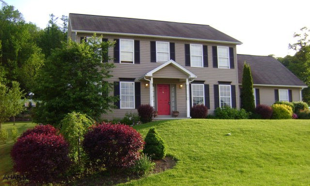 Located between Altoona and State College.  4 Bedroom 2 1/2 Bathroom immaculate and spacious 2 story.  Features large corner lot, 2 car garage, rear deck and gazebo, eat-in kitchen, family room with fireplace, full bathrooms with double sinks, & large walk-in closets.  Bellwood Schools.