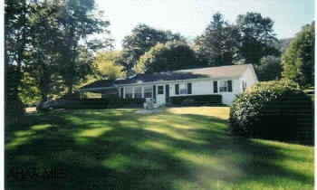 Combination residence/business property. Beautiful ranch style home along with 2-commercial buildings in rural setting. 16x12 Workshop in basement. Perfect property for machine shop, wood working shop, auto (business or hobby), and a well-kept house to boot. The perfect combination.