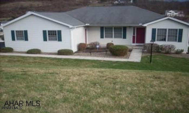Very nice and spacious home with 4 bedrooms and 2 1/2 baths, located in desirable, Penn Farm Estates.  Eat-in oak kitchen opens to a huge living area with fireplace and French doors opening onto a large deck which overlooks an awesome, vinyl fenced yard.  Large master suite w/ walk in closet and master bath w/jetted Jacuzzis tub.  Lower level has an impressive family room w/ 2nd fireplace, an incredibly large bonus bedroom with sitting area and walk-in closet.  Excellent 1 story living.  This home has many possibilities, just add your very own personal touch. The lower level would be a great set up to accommodate an in-law suite, with minor modifications.