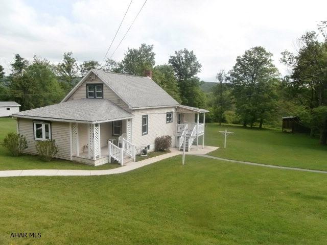 Well maintained home with large lot and two car detached garage. Storage under garage. Paved drive. Very clean home. Storage shed. Short walk to Patton Park.