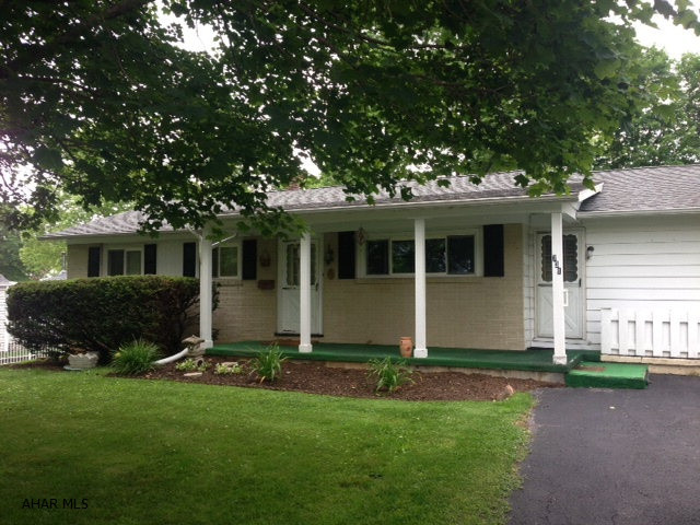 Sweet home in fantastic neighborhood. Lots of potential with large eat-in kitchen. Spacious laundry room, 2 full bath and full basement with work benches and storage shelves. Quiet street and close to town.