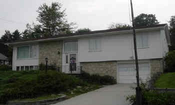 Well built home.  Nice lot, large workshop shed, hot tub in basement, 2 sided fireplace in living room and kitchen.