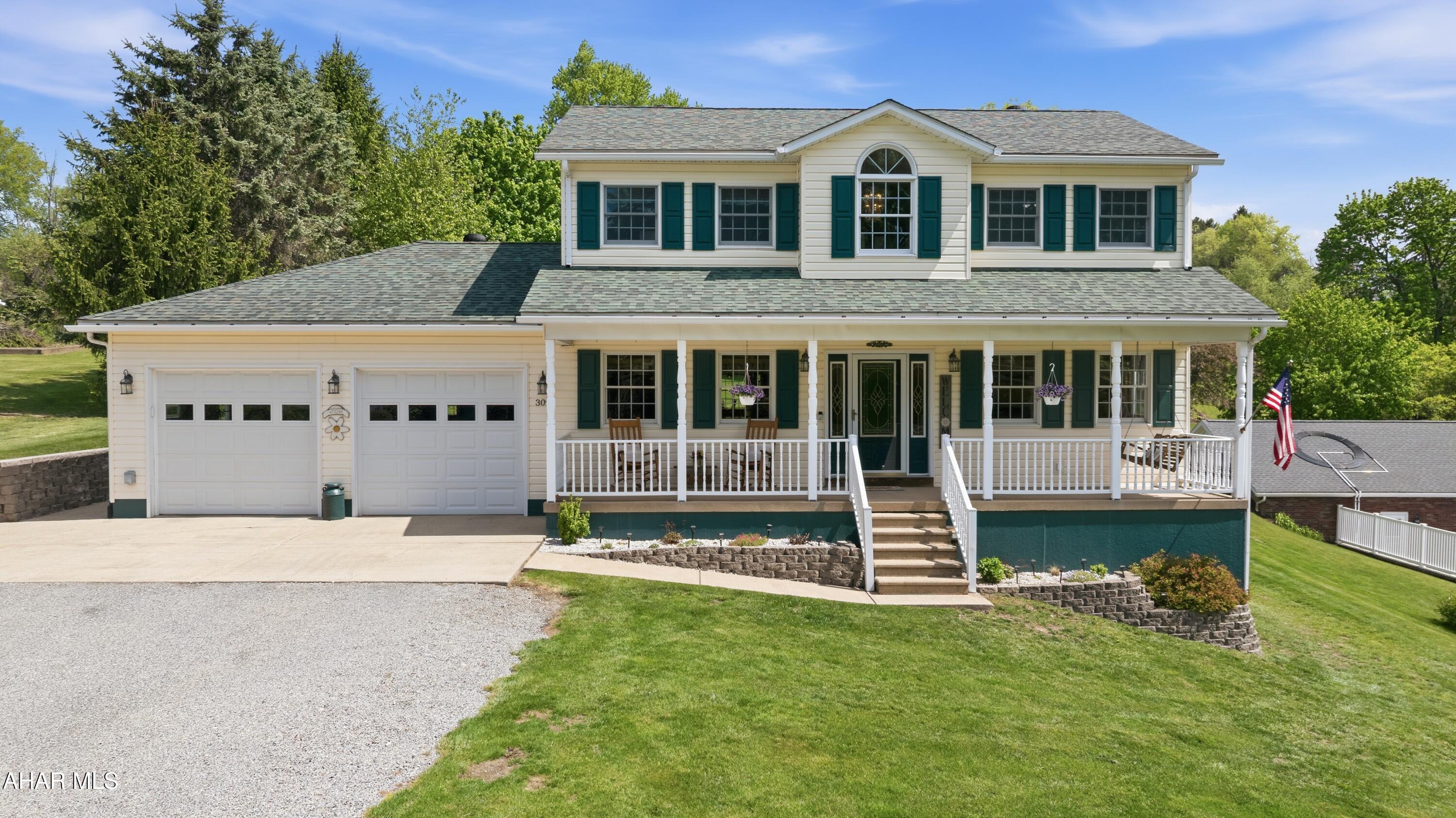 Welcome to 309 Cullis Lane in East Taylor Township! A stunning custom-built residence completed in 2000 that blends timeless craftsmanship with upscale comfort throughout. Meticulously maintained with exceptional attention to detail, this luxury home offers an elegant and thoughtfully designed layout perfect for both everyday living and entertaining. Step inside the grand two-story foyer that sets the tone for the rest of the home, leading into a formal living room and an expansive kitchen featuring beautiful oak cabinetry, a pantry, and generous workspace. The heart of the home is the breathtaking family room showcasing soaring vaulted ceilings with exposed beams, skylights that flood the space with natural light, and a cozy propane fireplace that creates a warm yet sophisticated atmosphere. A versatile flex space and convenient half bath complete the main level. Upstairs, you will find two spacious bedrooms, a beautifully updated full bathroom, and an impressive primary suite featuring a walk-in closet and a fully custom luxury bathroom complete with a stunning tile shower totaling three bedrooms. The finished lower level adds even more living and entertaining space with a large recreation area, custom bar, laundry area, abundant storage, and more. Outside, the property continues to impress with an oversized heated two-car attached garage, expansive flat yard, welcoming covered front porch, tranquil koi pond with waterfall feature, large rear deck, fire pit area, and a large powered shed with a garage door offering endless possibilities for hobbies, storage, or workshop space. This rare offering combines luxury, privacy, and functionality in one exceptional property. Call today for more information or to schedule your private tour!