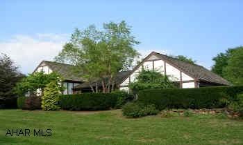TRADITIONAL TUDOR STYLE HOME IN SYLVAN HILLS. NEWLY ADDED BOB SHOWERS SUNROOM WITH TILE FLOOR. NEW BLACKTOP DRIVEWAY. GAS FORCED AIR AND HOT WATER HEAT WITH CENTRAL AIR. THIS HOME HAS MANY UNIQUE FEATURES AND EXCELLENT QUALITY OF WORKMANSHIP. HOME WARRANTY INCLUDED.