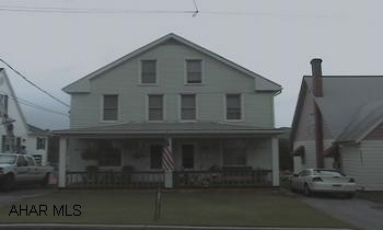 2 Story Duplex-Mint green vinyl siding-Owner & Tenant Occupied-Side by Side. Well maintained duplex - move in one side and let your tenants help pay the mortgage - 816 side stacked - Washer and dryer stay.  All utilities seperate except water/sewer - Move in condition - Good Buy!