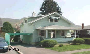 Two story vinyl sided.  Vinyl thermo windows.  Great house.  Must see.  Two full baths, one on first floor.  Finished basement.