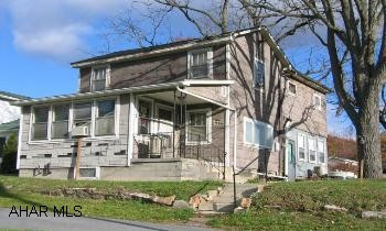 Two story home on large lot with lots of potential. Sewer hook-up just completed.
