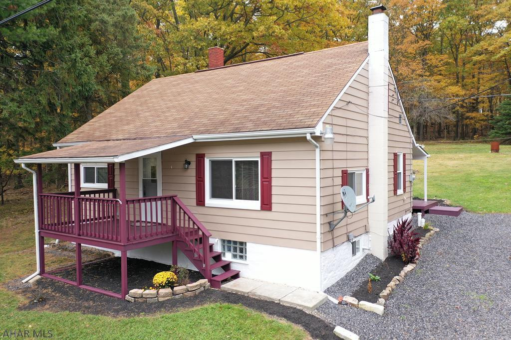 This updated & well maintained home is placed perfectly on its lot, with a huge open yard and tall trees bordering around the sides! Enjoy time w/ family & friends on the freshly painted back patio, sitting around the fire, or playing horseshoes! Lets not forget to mention the awesome location back mill run w/ lots of privacy, yet still close enough to town! It is MOVE IN READY! Pull right up to your front porch with the newly graveled half moon shaped driveway, w/ fresh landscaping all around the home. The living room features ship lap wood to give it character and French doors that take you to a room that would be perfect for an office/den or even turn it into a 3rd bedroom! It has a very large kitchen with plenty of cabinets! New: French drain, rain cap, windows, and breaker box.