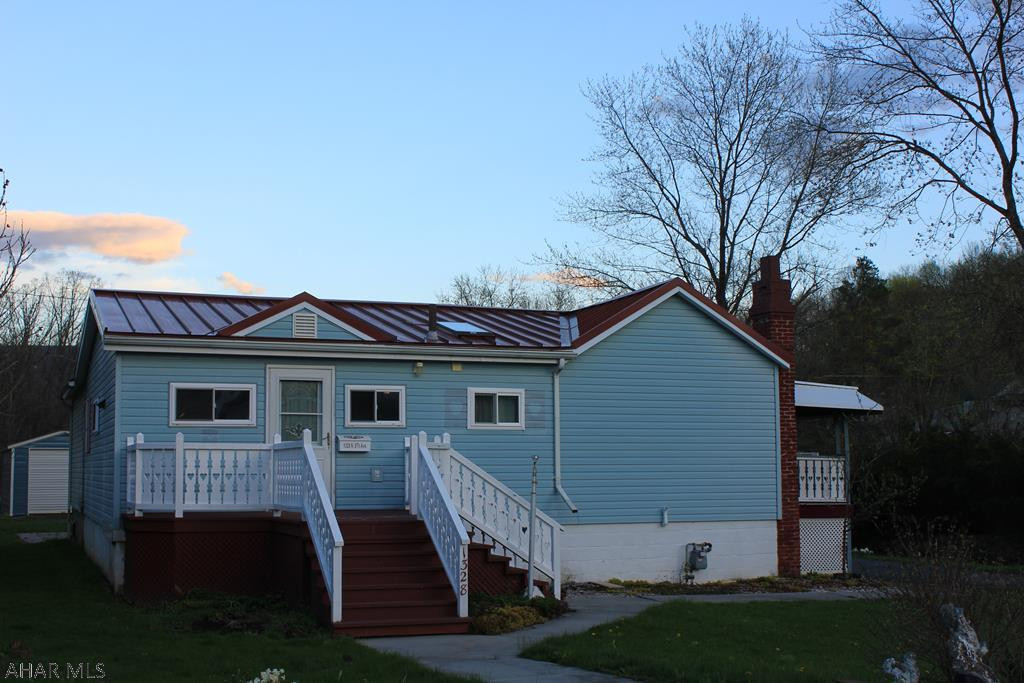 Single-story, 2 bedroom, 2 bath home in Juniata section of Altoona. Large eat-in kitchen, large master bedroom, master bath, 1st floor laundry. Detached garage with off-street parking. Adjoining parcel with new shed at rear of property also conveys.