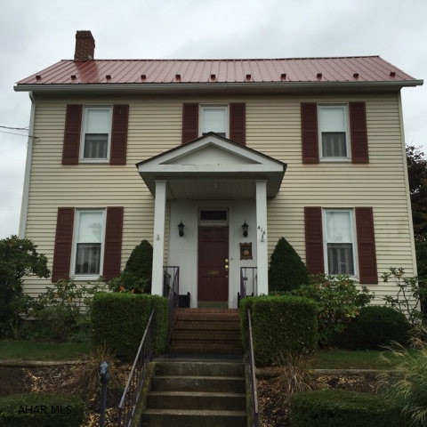 Well kept 2 story vinyl sided home on a nice street. Large living room with gas fireplace and attached dining are with built in china cupboard and French doors leading to covered deck. Newer sunroom with skylight. Conveniently located to downtown.