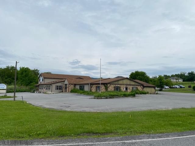 A 13,500 sf. Vacant Building situated on a 1.5 acre corner parcel located at a signalized traffic light with access from Rte 36 (Woodbury Pike) and Nason Dr. in Roaring Spring Pa. Positioned at the hard corner of the access road to Nason Hospital provides for a perfect site for Retail / Drug Store / Restaurant/ Professional Office.