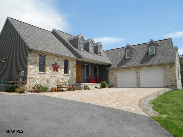 Beautiful stone home on a cul-de-sac, w/open floor plan and splendid view! Kitchen with maple cabinets and ceramic floor, recently updated with granite counter tops opens to a dining room and living room with vaulted ceilings and lots of windows offering natural sun light. Newly painted rooms. Oversize 2 car finished garage (30X21). Expansion opportunity exists on the 2nd fl. for a 12X16 fourth bedroom. Basement offers additional space for rec. room, bedroom & bath. Possibilities are endless in this charming home with many upgrades. Professionally landscaped, UPDATED!!! Paver apron to the front entrance and garage. Back yard is very private with large patio. Conveniently located to schools, shopping and I-99. Owner will entertain reasonable offers!!