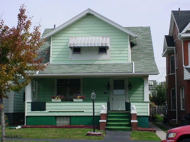 Sellers may assist with buyer's closing costs.  Cute, vinyl-sided home on a fenced lot with detached garage.  Large rooms, semi-modern kitchen and bath.  Basement is finished as a family room, summer kitchen, den, laundry and powder room.