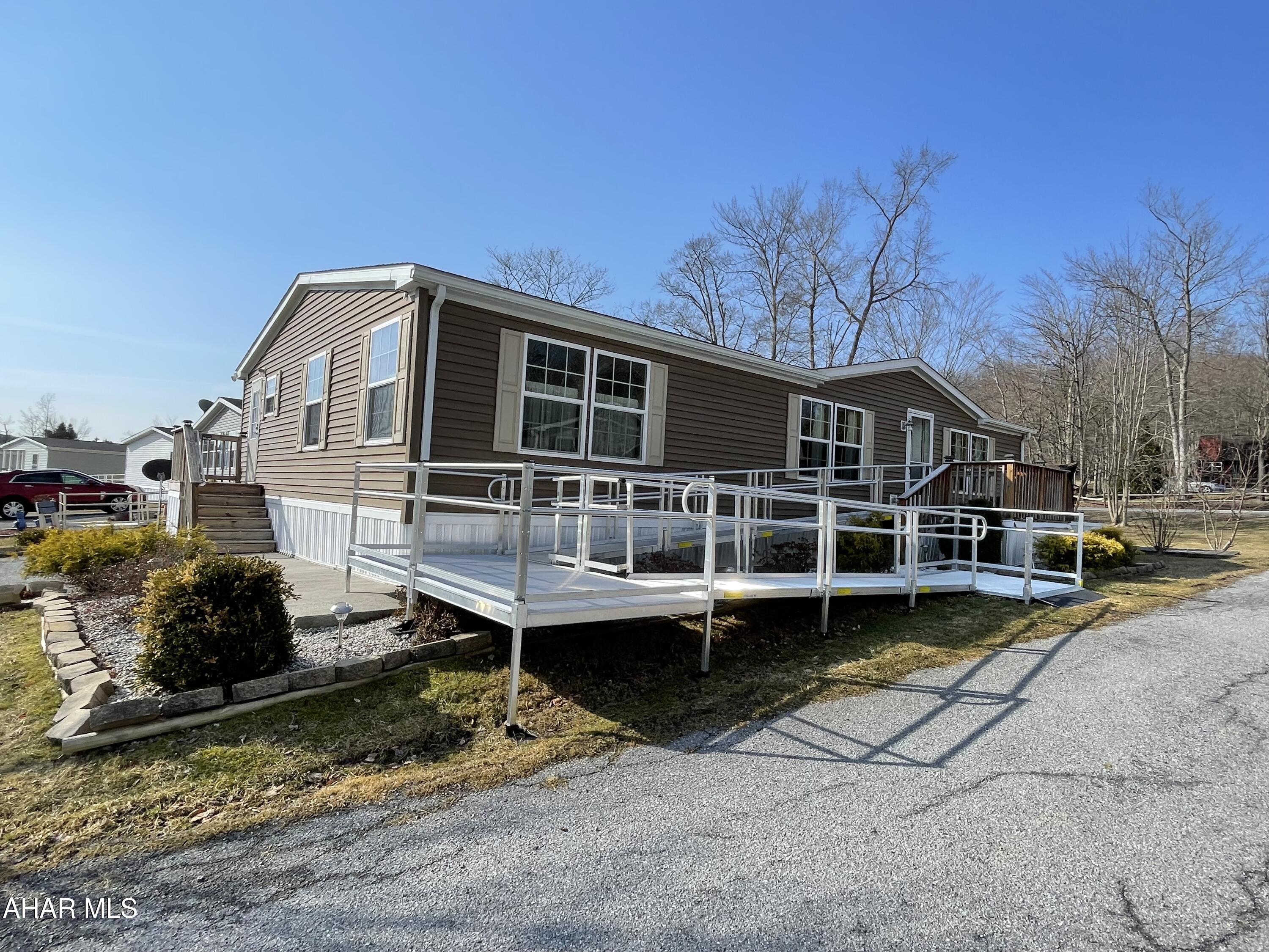 Here is your opportunity as this home is back on the market no fault of the home!!!  If you are looking for a stunning home that is a showroom masterpiece then this is the one for you! This meticulously maintained home has had several updates since purchasing it a few months ago... entire home has been professional painted, new trim has been installed throughout, all new appliances and a ramp was installed.  Ask for a detailed list of the furniture pieces that will be included in the sale of the home, they were purchased new.  This home sits on a corner lot allowing plenty of parking for guests in needed.  One step inside this spacious home and you will absolutely fall in love with being at home. Get ready to entertain as the layout allows the host to be apart of the party.  When guests leave relax in your massive master bedroom that fits a king sized bed and several additional furniture pieces.  No lack of storage as there is a walk in closet for all your clothes.  Take a dip in the large soaking tub or unwind with a hot shower.  The laundry is right outside the master bathroom door.  On the other side of the home are two large bedrooms each having their own walk in closet and a full bath between!  Did I mention the generator? Oh yes it has that too! No need to worry about being left in the dark!  Call today to schedule your showing and to ask about lenders for this home!