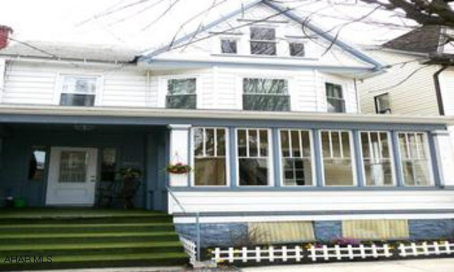 Large 4 bedroom home with spacious rooms. Nicely remodeled with new kitchen cabinets, carpet, paint and more.  Great for first time home buyers with all the updates for FHA.  Finshed 3rd floor with heat and closets. Definitely worth seeing!