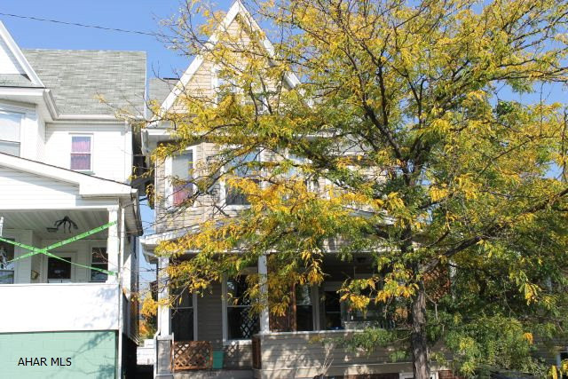 Spacious family home with large covered porch with a nice view. Fenced to yard with off street parking. Plenty of storage in walk-up attic. Pantry and 1/2 bath on 1st floor. Bonus room on 2nd floor.