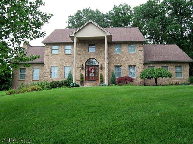 Has all the "I Wants", beautiful curb appeal. Private back yard, covered deck, attractive landscaping, over-sized 2 car garage and that is just the outside...In side vaulted entrance, formal living and dining room, large kitchen with granite counters and eating area, Great Room with brick wall fireplace, 4 bedrooms and 4 full baths, 1 half bath, 3 zone, family room and office in basement.