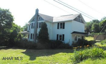 Great house - modern kitchen and bath.  Large rooms.  1.6 acres of ground.  Reade Township, Cambria County.  Property will be getting public sewer in approximately Spring 2011 through Glendale Valley Municipal Authority.  Anticipated tap-on fee will be $1500.  Monthly fee is estimated at $55/month.  Buyer will be responsible for all fees and costs to hook up. Property condition may restrict FHA/VA financing options - Prequalified Buyers Only