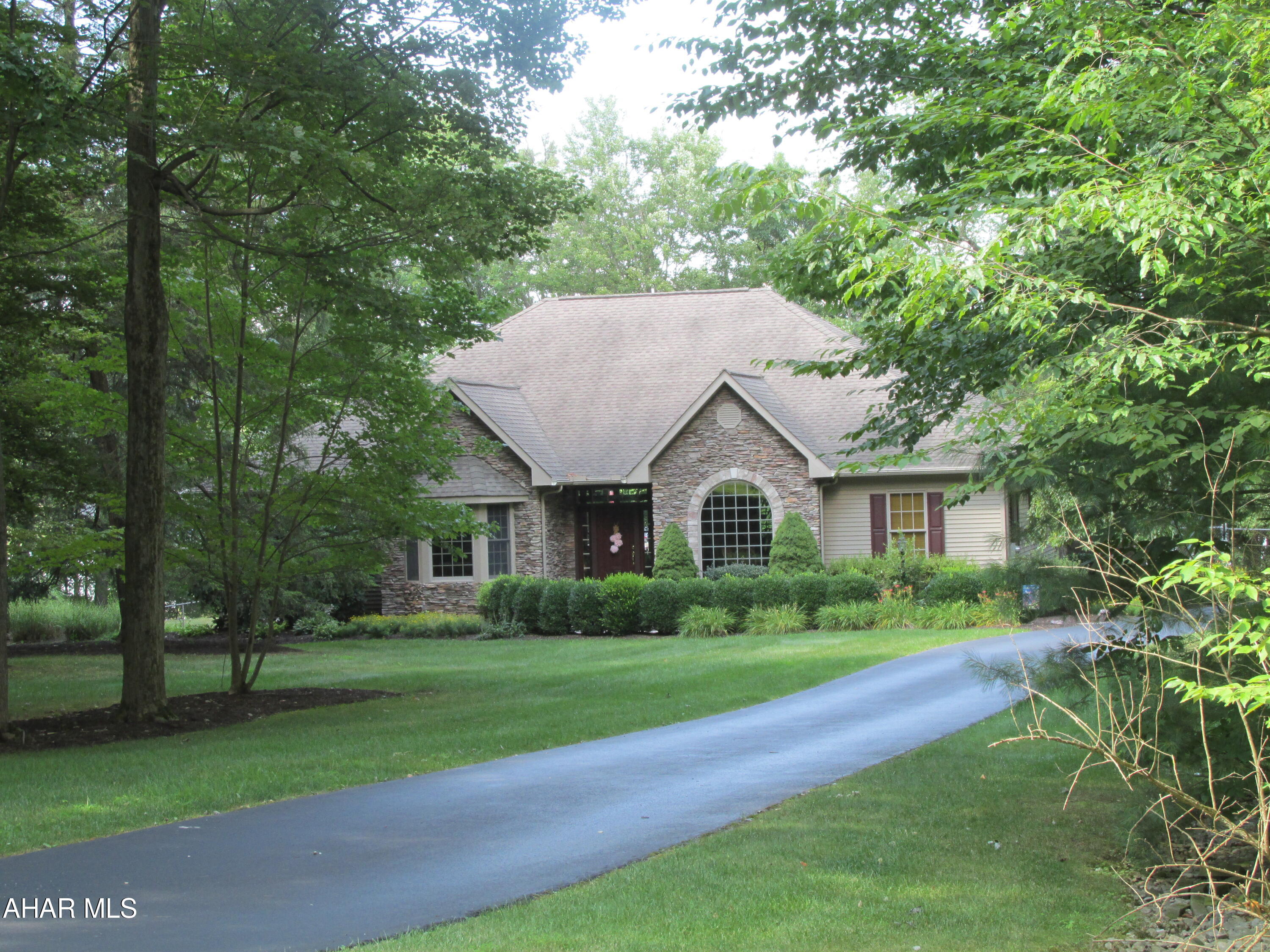 YOUR PERFECT PLACE! Pristing beauty on Edgewood Drive, Tyrone. Conveniently located halfway between Altoona & State College. This pretty one story offers an elegant hardwood entry, 9ft ceilings throughout, large open living room, dining room, kitchen w/quartz counters, tile floor, first floor laundry, den/office or 4th BR, half bath, BR2 & BR3 have a Jack n Jill bath. MBR Suite with shower, whirlpool tub, double vanity, walk-in closet, new furnace, central air & hot water tank, central vac. Water is a shared community well. *See utility info. Beautiful outdoor living w/fenced yard, part covered back & open deck, 2 car garage & full unfinished basement w/walk out - don't wait on this one!