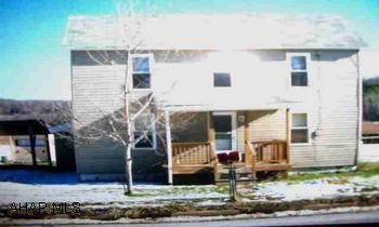 2 story, 3BR with carport 2 story, 3BR with carport, black topped driveway & storage trailer