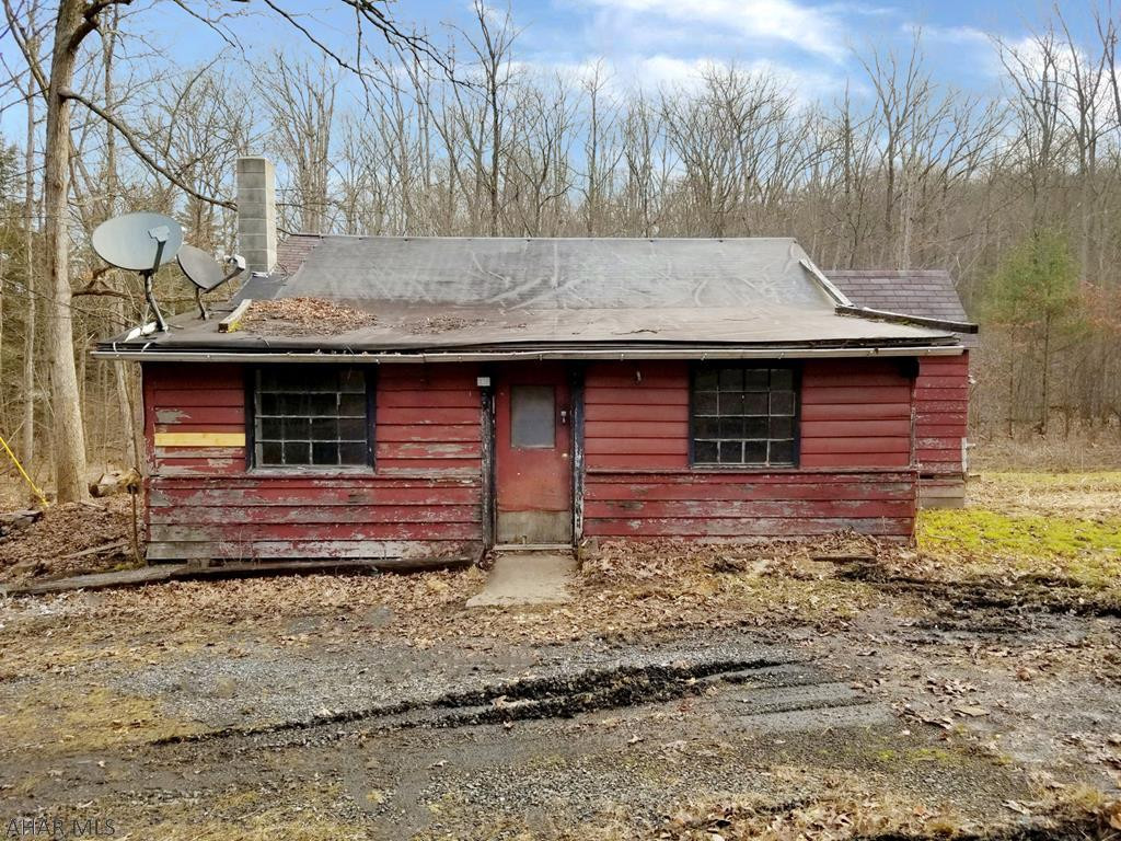 Allensville Road approximately .5 miles north of the Rocky Ridge Natural Area in Huntingdon County and a quick drive to Greenwood Furnace State Park. With renovation work this 2 bedroom home that sits on 1.4 acres could be converted in to a recreation camp or restored into a single-family year-round residence. Sellers will review offers after the property has been on the market 7 days. Offers submitted at PropOffers.com by selling (buyer's) agent ONLY. Offers to include proof of funds and/or pre-qualification letter. Minimum Earnest Money Deposit of 1% of the Purchase Price or $1,000, whichever is greater.
