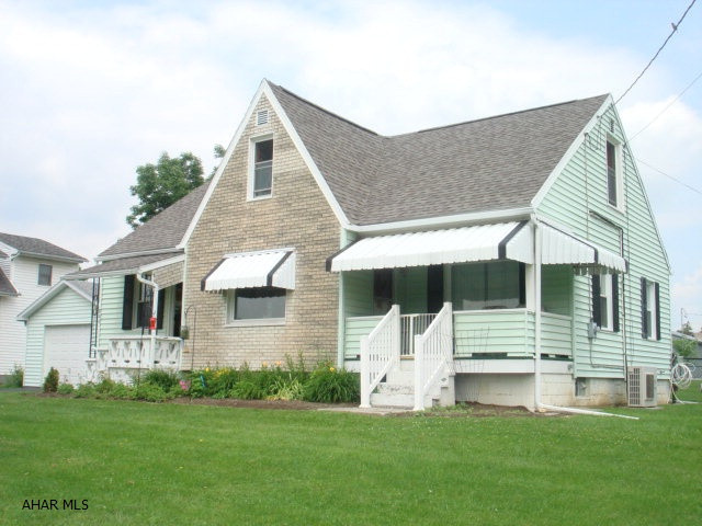 This two story home is a must see inside with the entire second floor remodeled for master suite.  Features three bedrooms, two baths, large fenced in back yard, one car detached garage, macadam driveway and sidewalks, and storage shed.  Remodeled upstairs has separate electric heat and air conditioning. Storage areas on second floor.