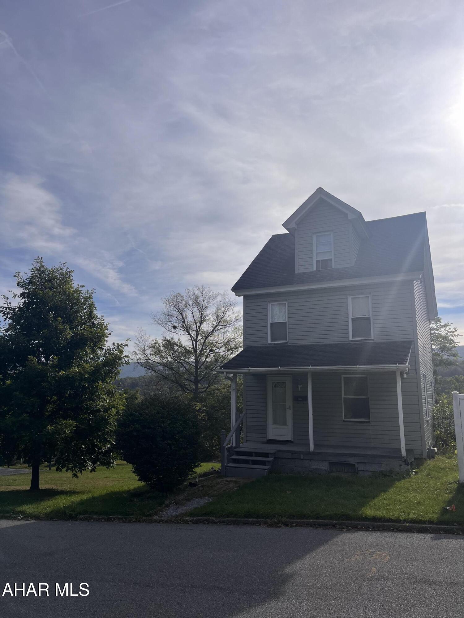 Easy to show, this 3BR home sits on a sweet corner lot with space to expand on your outdoor living space. Attic is the 3rd BR but nice and bright! Newer roof and sewer line. Updated kitchen (w/walk in pantry) and bath. 2nd Floor bath big enough to add laundry to 2nd floor if so desired. 2nd bath is in basement.,