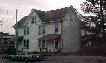 Large duplex - one side vacant. 3 car garage. Roof must be replaced on garage . All utilities are separate.