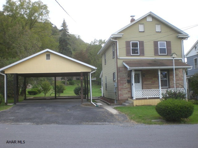 Charming 2-story in Bedford. First level offers a Living Room, Dining Room, Kit, Laundry Room and Full Bath. Second level has three Bedrooms or Two w/ a Den and a half Bath. Thermo pane windows, walls & attic have blown in insulation, oil forced air heat and 100-amp electric. 2-car carport. Large yard and close to everything.