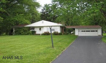 This lovely 3 bedroom, 1 bath ranch style home is situated in "Meadowbrook Terrace" and  is within walking distance to schools.   Relax in the spacious sunroom just off the kitchen or enjoy quiet time in front of the woodburning fireplace in the living room.  Hardwood flooring through most of home. Attached 2 car garage & full basement that can be finished your way. - Call Chris Bollman 814-215-0017 for more details.