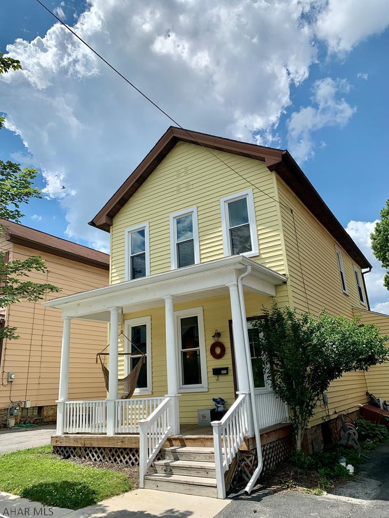Check out this well maintained home in the borough of Hollidaysburg. Beautiful laminate wood flooring throughout the Living room, Bonus room, and Dining room. The kitchen has been updated and newer windows have been installed throughout the house. Newer central air unit, furnace, and water heater. The back deck is covered and cozy with a nice fenced in yard. This home is within walking distance of schools, the ymca, and more. Call today to schedule a showing.